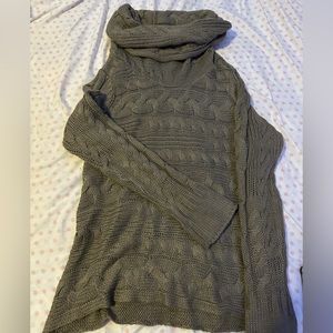 Brown chunky knit sweater with oversized turtle neck